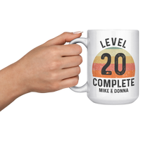 Load image into Gallery viewer, 20th_Anniversary_Mug_Level_20_Complete__15oz_White_LH_Model_Mockup.png
