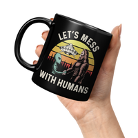 Load image into Gallery viewer, Bigfoot_Gifts_Bigfoot_Mug_Bigfoot_Coff_11oz_Black_LH_Model_Mockup.png
