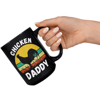 Load image into Gallery viewer, Chicken_Dad_Mug_Chicken_Dad_Coffee_Mug_15oz_Black_RH_Model_Mockup.png
