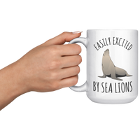 Load image into Gallery viewer, Easily_Excited_by_Sea_Lions_Mug_15oz_White_LH_Model_Mockup.png
