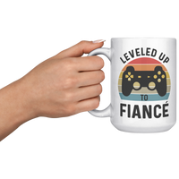 Load image into Gallery viewer, Fiance_Mug_Leveled_Up_to_Fianc_Gamer_15oz_White_LH_Model_Mockup.png
