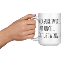 Load image into Gallery viewer, Funny_Carpenter_Mug_-_Measure_Twice_Cut_15oz_White_LH_Model_Mockup.png
