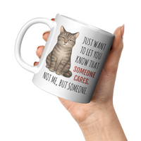 Load image into Gallery viewer, Funny_Cat_Mug_-_Someone_Cares_But_Not_Me_11oz_White_LH_Model_Mockup.png_15047852