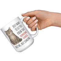Load image into Gallery viewer, Funny_Cat_Mug_-_Someone_Cares_But_Not_Me_15oz_White_RH_Model_Mockup.png_15047859
