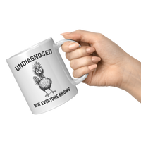 Load image into Gallery viewer, Funny_Undiagnosed_Chicken_Mug_11oz_White_RH_Model_Mockup.png