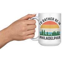 Load image into Gallery viewer, Id_Rather_Be_in_Philadelphia_Mug_15oz_White_LH_Model_Mockup.png
