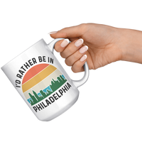 Load image into Gallery viewer, Id_Rather_Be_in_Philadelphia_Mug_15oz_White_RH_Model_Mockup.png
