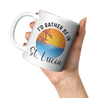 Load image into Gallery viewer, Id_Rather_Be_in_St_Lucia_Mug_11oz_White_LH_Model_Mockup.png
