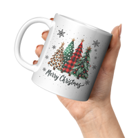 Load image into Gallery viewer, Merry_Christmas_Mug_with_Xmas_Trees_and__11oz_White_LH_Model_Mockup.png
