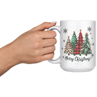 Load image into Gallery viewer, Merry_Christmas_Mug_with_Xmas_Trees_and__15oz_White_LH_Model_Mockup.png
