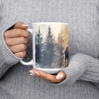 Load image into Gallery viewer, Moose_Mug_Watercolor_Moose_in_Forest_Co_15ozWhiteMugLifestyleLHChest_Mockup.png
