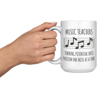 Load image into Gallery viewer, Music_Teacher_Mug__Turning_Potential__15oz_White_LH_Model_Mockup.png
