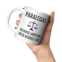 Load image into Gallery viewer, Paralegal_Mug_-_Because_Lawyers_Need_Her_11oz_White_LH_Model_Mockup.png
