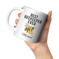 Load image into Gallery viewer, Personalized_Best_Beekeeper_Ever_Mug_11oz_White_LH_Model_Mockup.png
