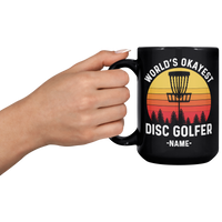 Load image into Gallery viewer, Personalized_Disc_Golf_Mug_-_Worlds_Oka_15oz_Black_LH_Model_Mockup.png
