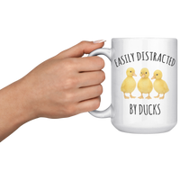 Load image into Gallery viewer, Personalized_Easily_Distracted_by_Ducks__15oz_White_LH_Model_Mockup.png
