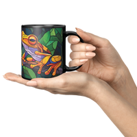 Load image into Gallery viewer, Stained_Glass_Frogs_on_a_Branch_Mug_Lifestyle_Presentation_Hands_Mockup.png
